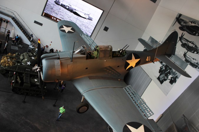 07 A Douglas SBD Dauntless Dive Bomber on display at the National World War II Museum in the US Freedom Pavilion (The Boeing Center) in New Orleans, Louisiana, USA with Seamus Kieran, Mikaila Bloomfield and Emily Barber Photo Credit Zack Neher